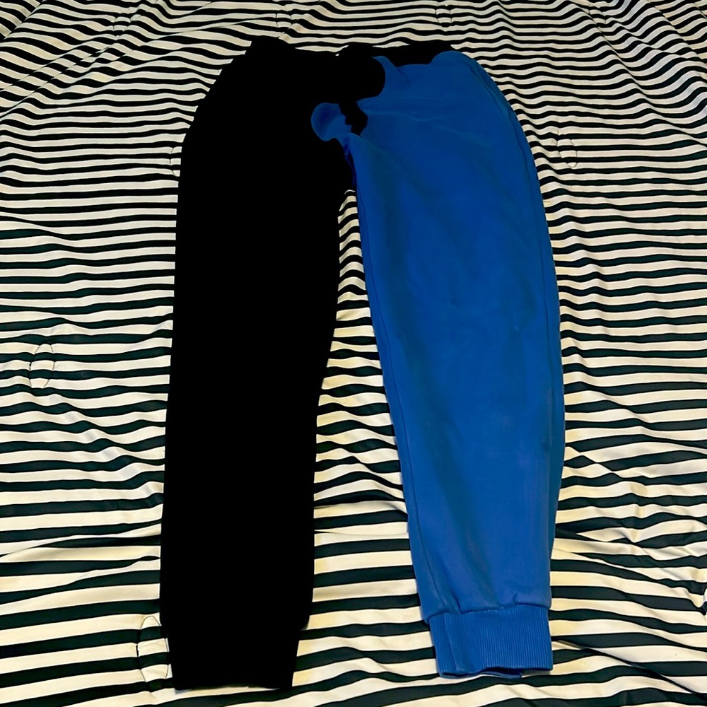 Blue and black joggers split down the middle, nice fit, very comfortable.
